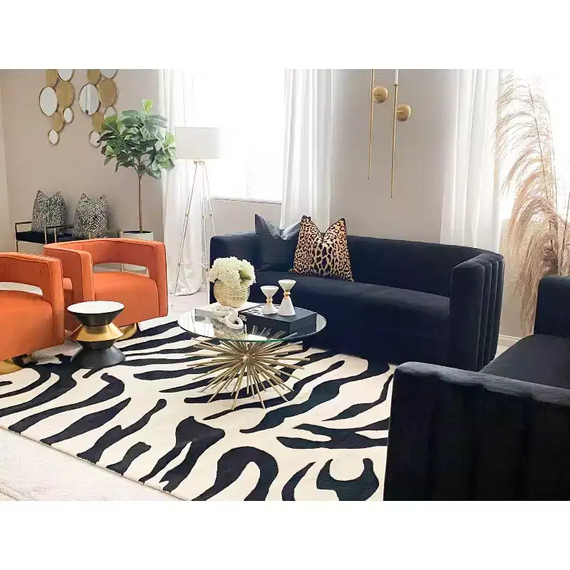 Tavolino da salotto Azizi con piano in pietra, tavolino decorativo nero e oro per soggiorno o camera da letto